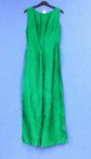 A ladies custom made sleeveless evening gown, in emerald green shot satin, sleeveless with low