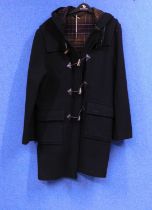 A gentleman's navy blue wool hooded duffle coat by Barbour, size S