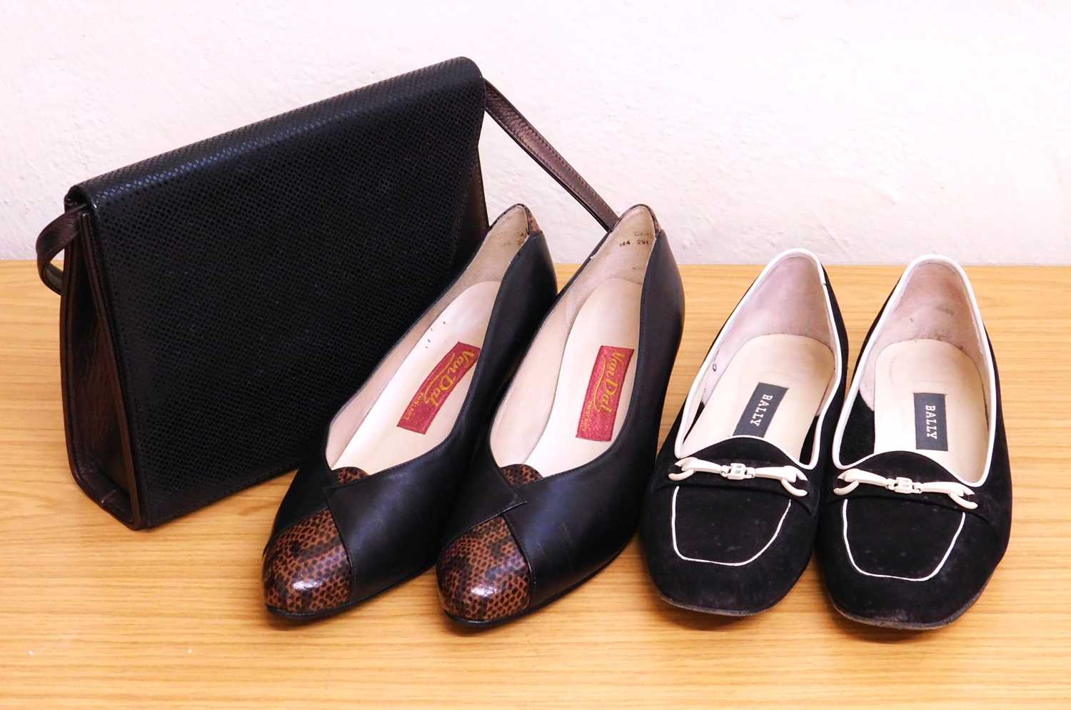 A pair of Bally black and cream low heel loafers, size 5 1/2, together with a pair of Van Dal