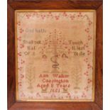 A mid 19th Century needlework sampler with alpha numeric stitching, religious text and Adam & Eve in