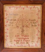 A mid 19th Century needlework sampler with alpha numeric stitching, religious text and Adam & Eve in
