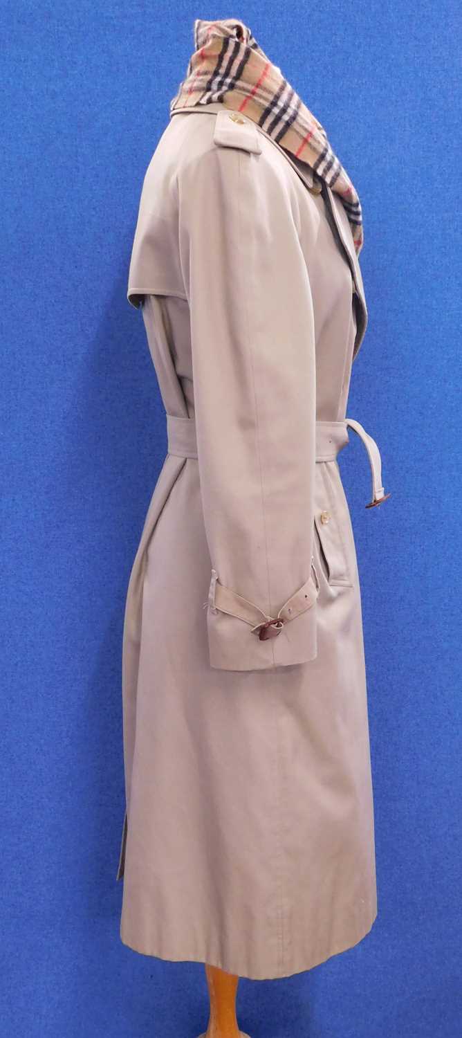 A lady's Burberry double breasted trenchcoat, size 16 Petite, together with a Burberry cashmere - Image 3 of 12
