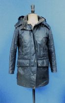 A lady's coat by Belstaff, the black/brown three quarter length coat with zip front, storm flap,