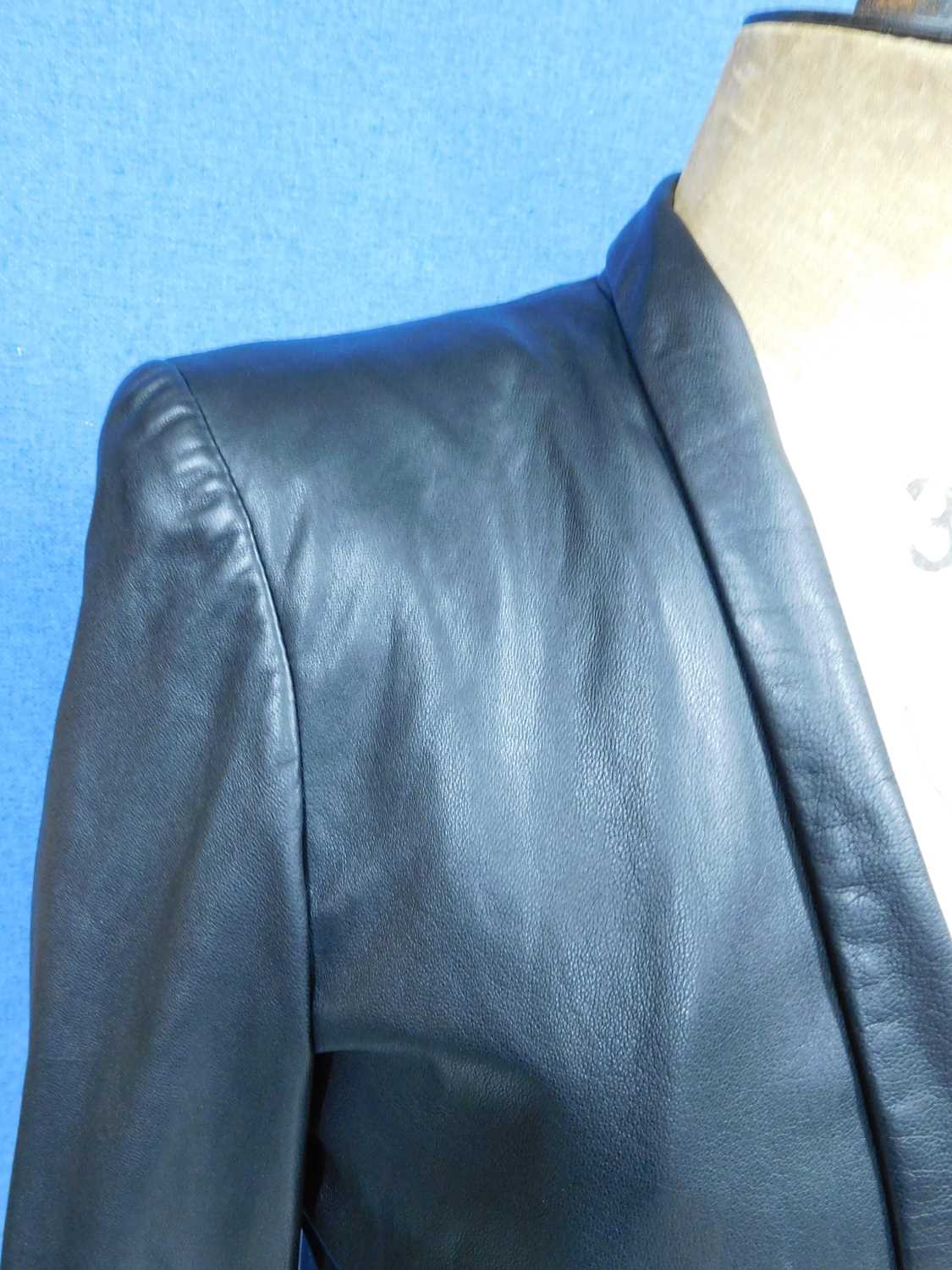 A black leather blazer Helmut Lang, with single button fastening, front slit pockets, wool trimmed - Image 3 of 6