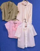 Four mid 20th Century ladies blouses to include a cream silk long sleeved blouse, an olive green
