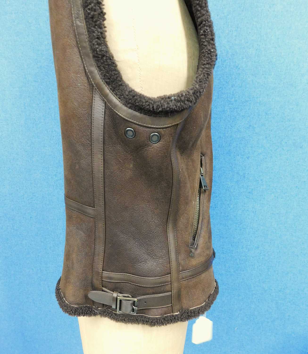 A lady's Ralph Lauren Polo brown leather and sheepskin gillet, with asymetric front zip, zip and - Image 3 of 7