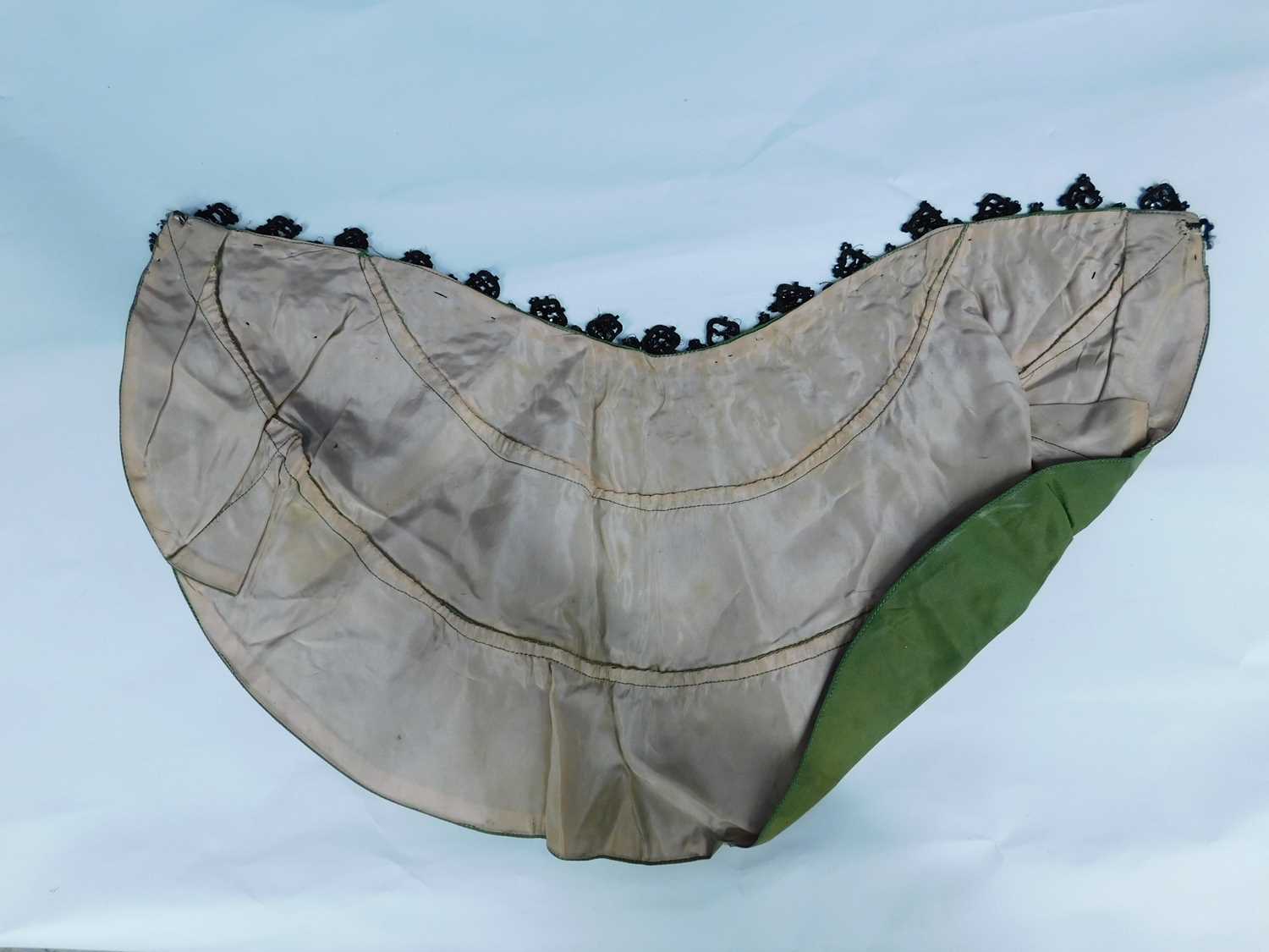 A late 19th/early 20th century children's cape, the olive green silk arc with tailored shoulders - Image 3 of 4