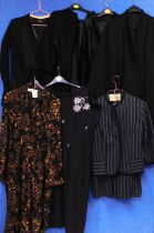 Seven items of assorted ladies black evening and day wear