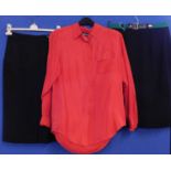 A red silk shirt by Diane Gilman, size M, together with two navy blue skirts by Basler, (3)