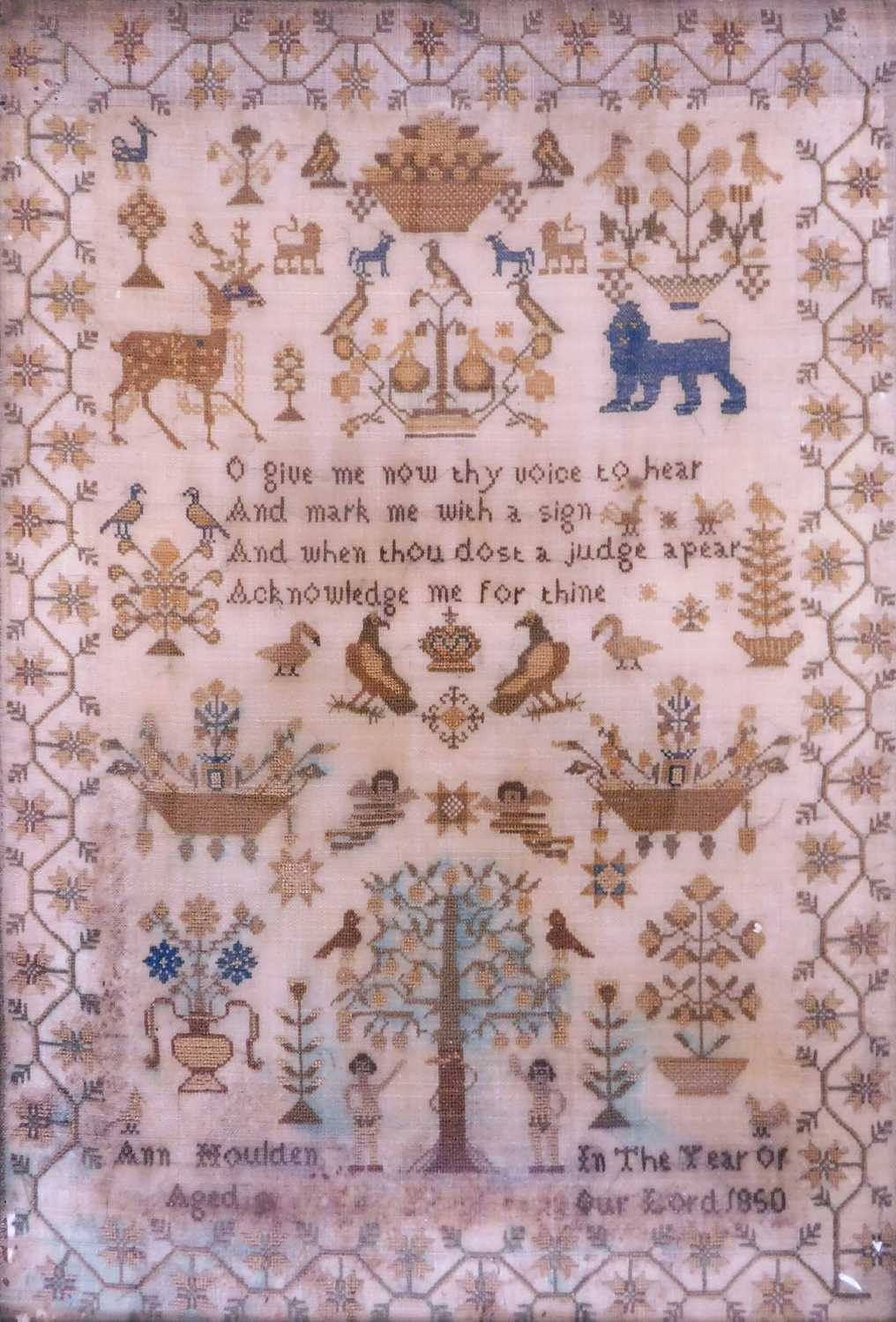 A mid 19th century needlwork sampler, with religious text, flora and fauna decoration, named 'Ann