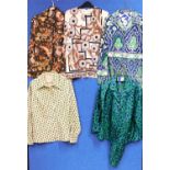 A selection of mid 20th century printed ladies tops to include a green and blue satin matching