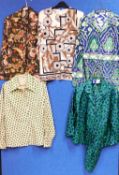 A selection of mid 20th century printed ladies tops to include a green and blue satin matching