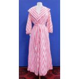 A mid 20th century cotton wrapover dress, the pink patterned and white stripe dress with wide