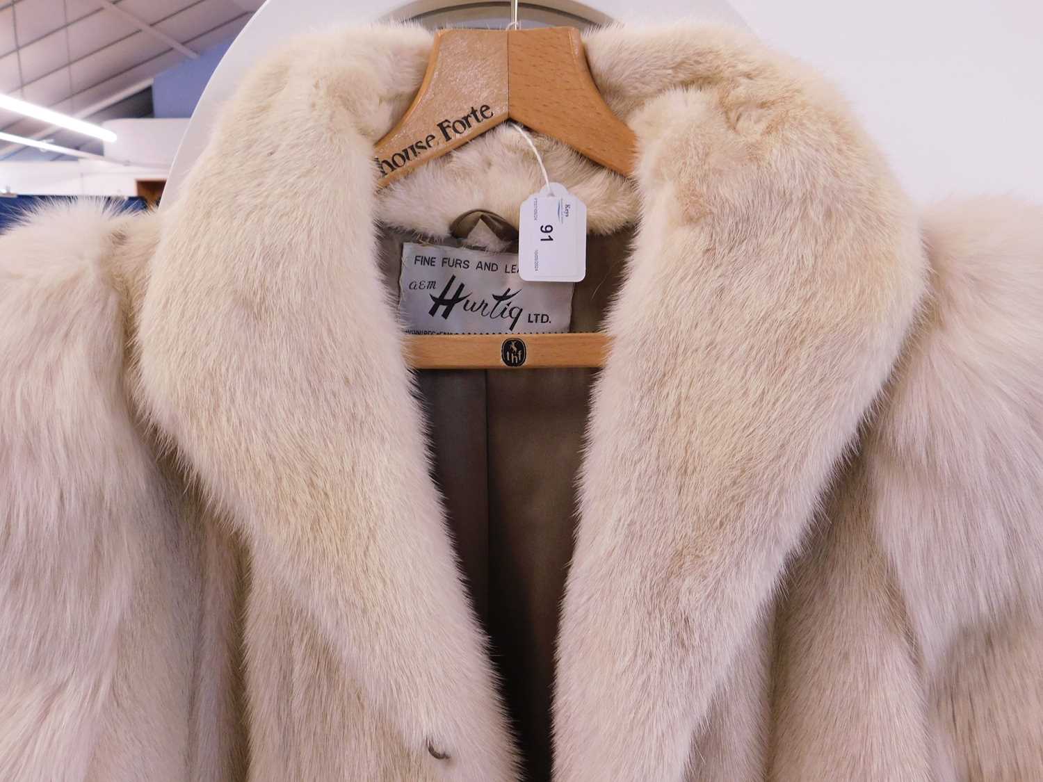 A lady's full length cream fur coat by Hurtiq Ltd overall good with no obvious signs of wear or - Image 6 of 14