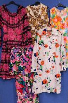 Five mid 20th Century patterned ladies dresses