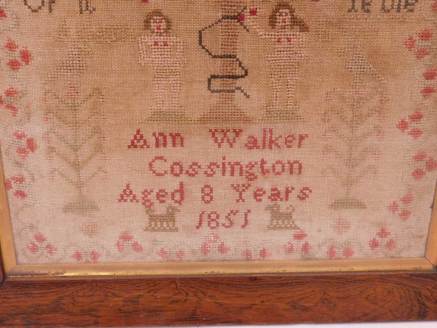 A mid 19th Century needlework sampler with alpha numeric stitching, religious text and Adam & Eve in - Image 3 of 3