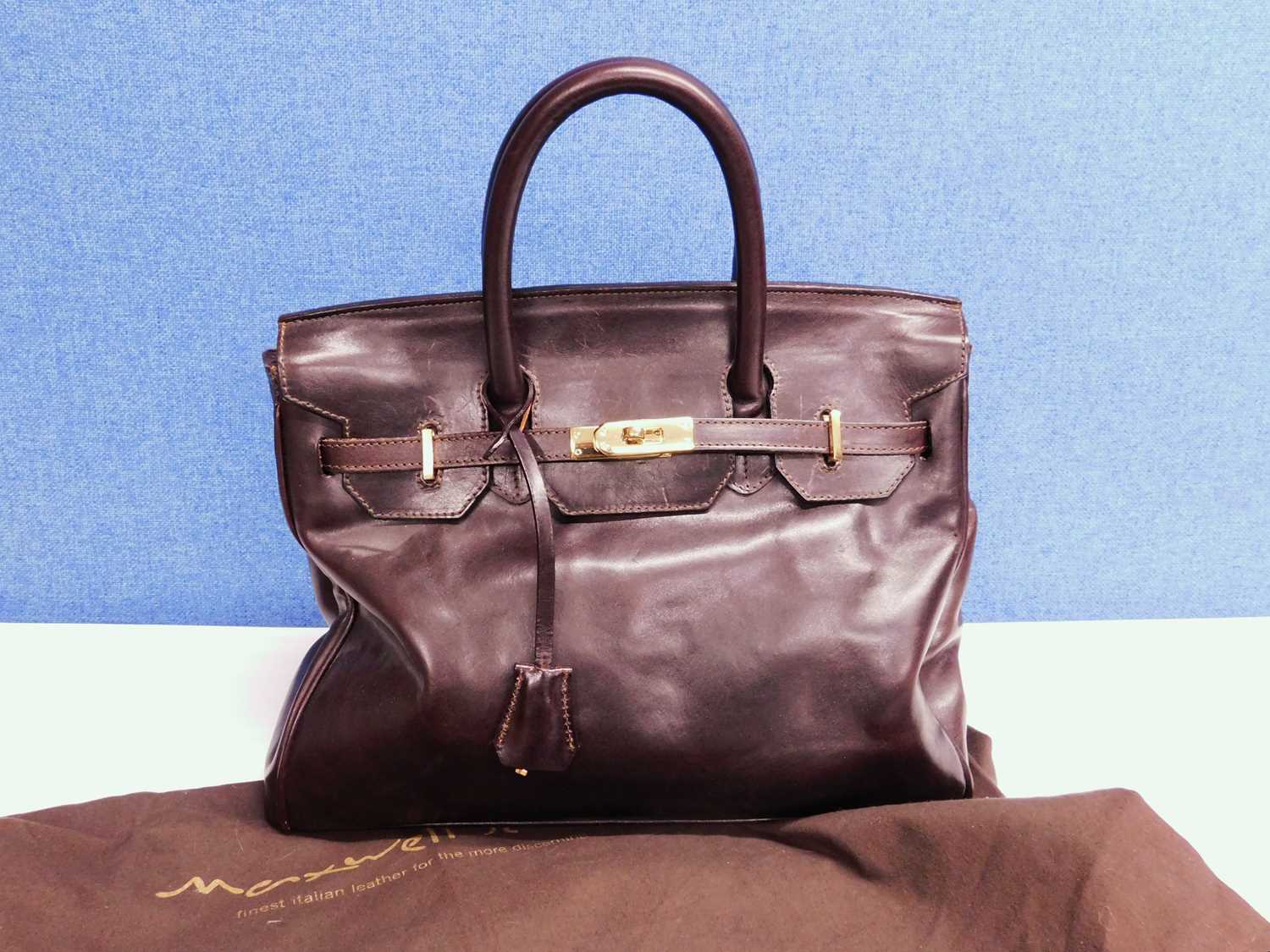 A dark brown leather bag by Maxwell Scott, approx 35cm wide with original dustbag