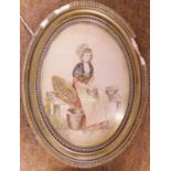 An early 20th century needlework picture of a seated maiden, with painted detail to face and arms,