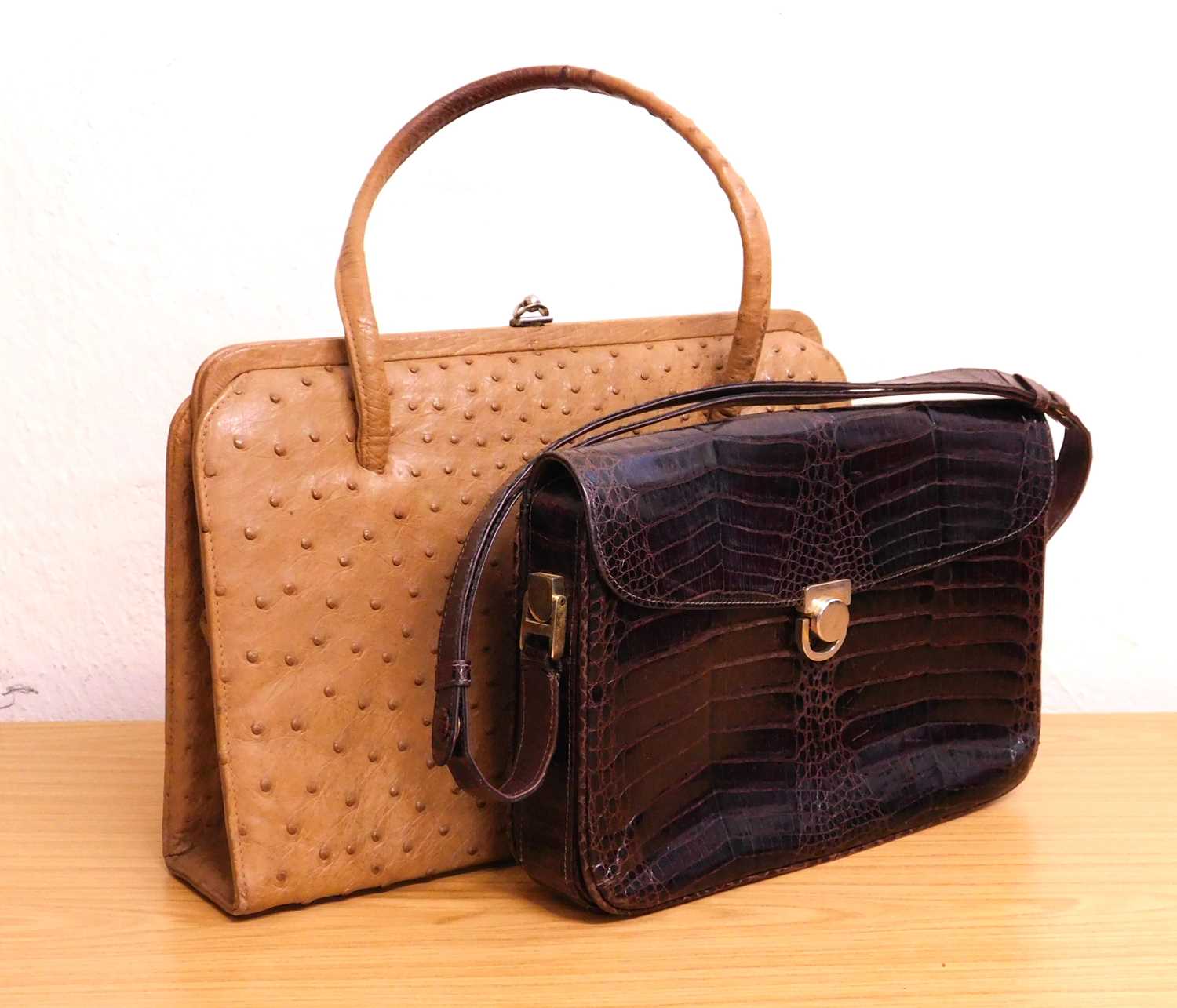 Two vintage handbags, to include a tan ostrich leather with suede lining, approx. 32cm wide,