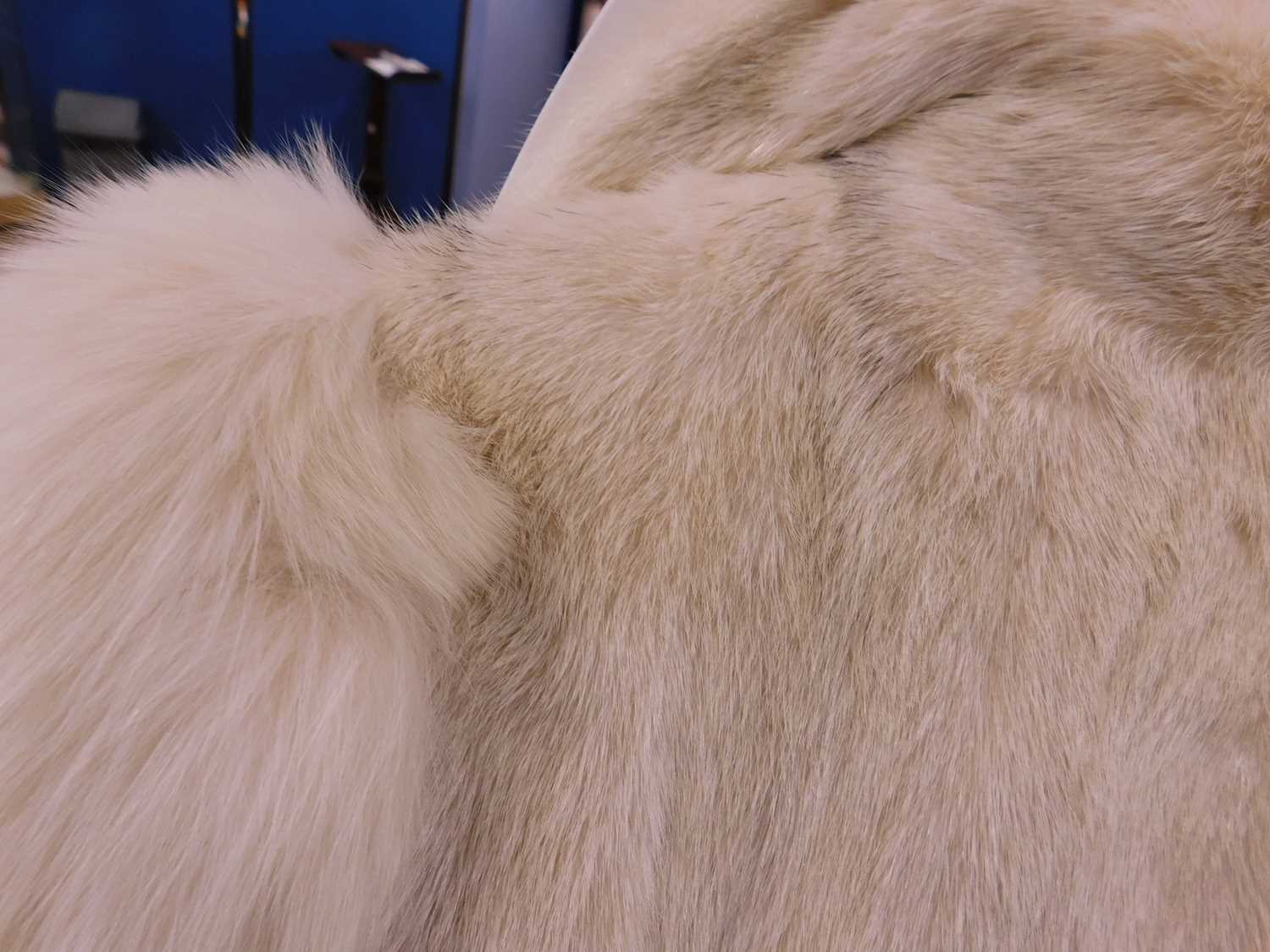 A lady's full length cream fur coat by Hurtiq Ltd overall good with no obvious signs of wear or - Image 9 of 14