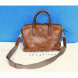 A tan leather tote bag by The Bridge, with top zip fastening with hand straps and detachable