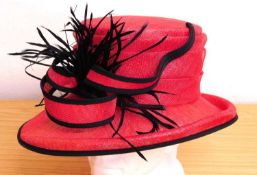 A Cappelli Condici straw hat in red with black trim and detail, new with tags