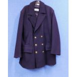 A gentleman's double breasted navy blue wool pea coat by Gloverall, 42" chest