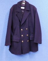 A gentleman's double breasted navy blue wool pea coat by Gloverall, 42" chest