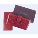 A Givenchy burgundy leather foldover secretary, the suede and leather wallet with allover Givenchy