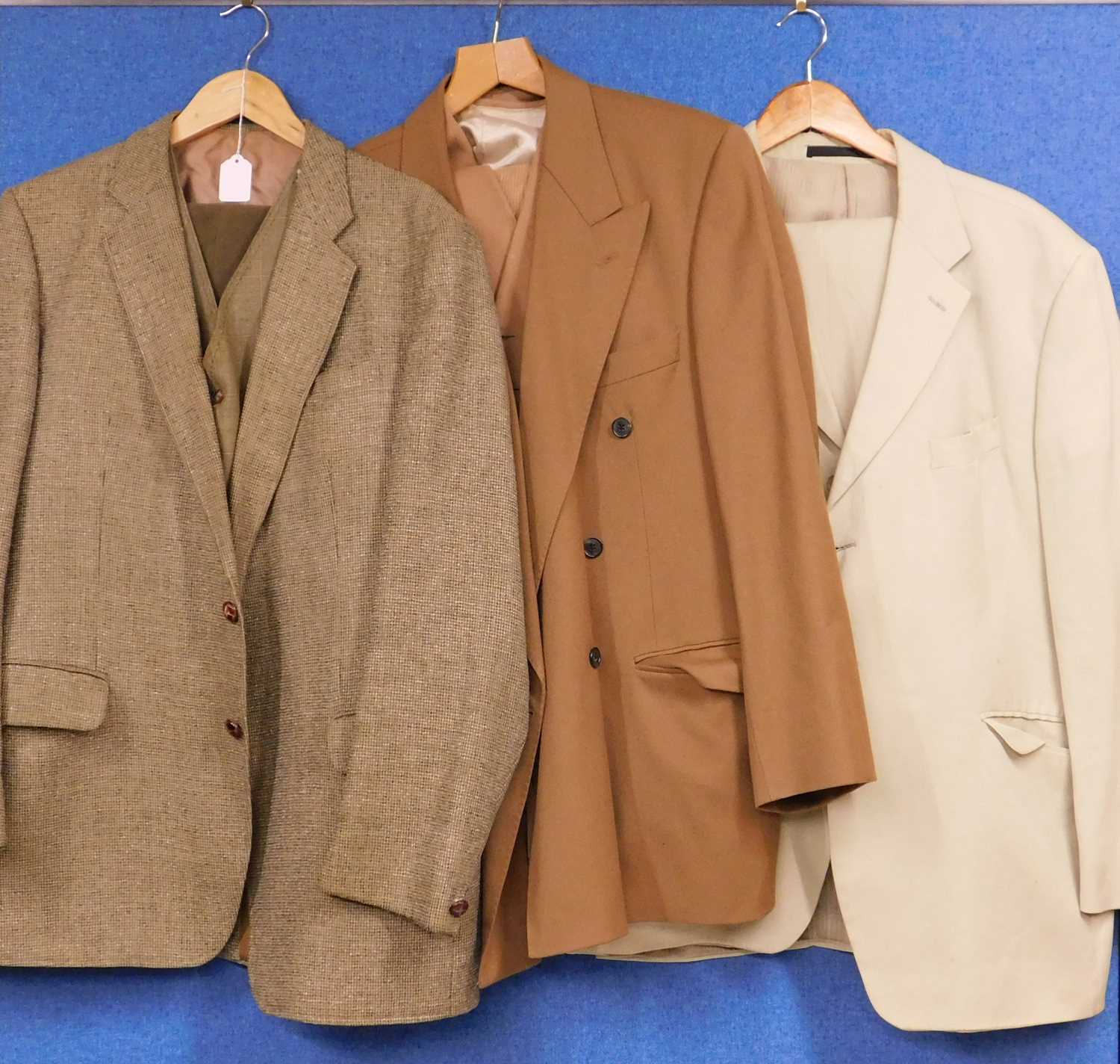 A quantity of menswear to include a beige linen blend jacket and trousers, 46 M, a double breasted