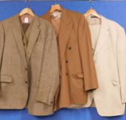 A quantity of menswear to include a beige linen blend jacket and trousers, 46 M, a double breasted