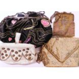 Four evening bags to include one by Zandro Rhodes, the black embroidered satin Zandra Rhodes bag