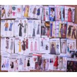A quantity of sewing patterns to include vintage style dresses, Vogue patterns, and others, (qty)