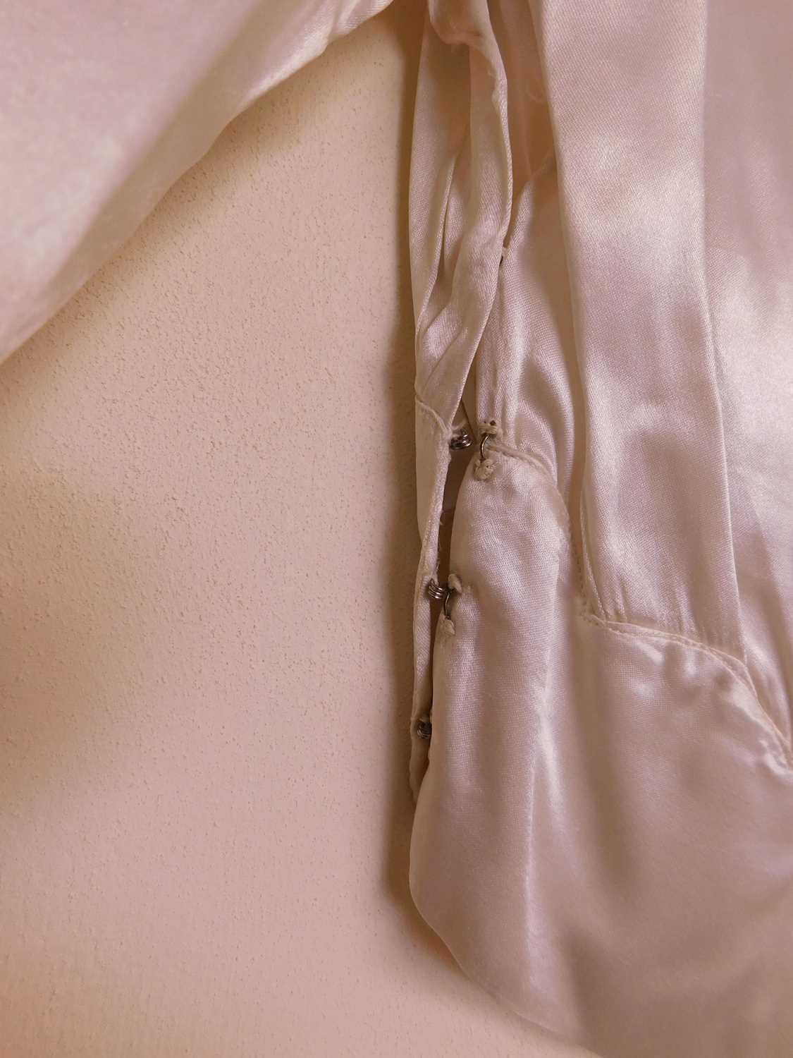 A 1930-40's cream satin blouse, V-neck with cutwork detail to front and back, with gathered body, - Image 3 of 11