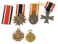 Quantity of 5x Third Reich,German, Second World War medals to include Atlantic wall medal, War Merit