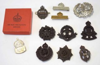 Quantity of 11 cap badges to include 2x on imperial service badges, Australian 38th Battalion (the