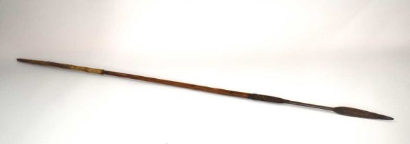 Aboriginal / tribal throwing spear with animal hide band on bottom of shaft. Metal wire hatching