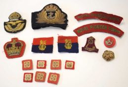 Quantity of British 20th century cloth insignia to include: Royal pioneer corps shoulder titles