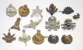 Quantity of 20th century cap badges to include, Victorian ‘The Boarder regiment’ collar dog, WW1