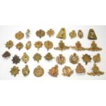 Quantity of 20th century British military cap badges to include Royal Army Ordinance Corps, Royal