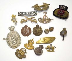 Quantity of 20th century cap badges to include 21 SAS Artists Rifles white-metal cap badge, RFC