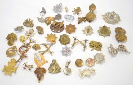 Quantity of mixed 20th century British and commonwealth cap badges to include R.A.C, Observer Corps,