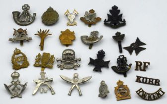 Quantity of 23 cap badges to include: Indian made "16th Queens lancers" by Bihari bros Aligarh,