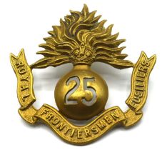 A First World War brass cap badge of the 25th (Frontiersmen) Battalion. The Royal Fusiliers