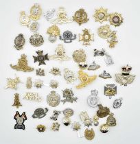 Quantity of ERII Military staybrite cap badges to include Royal Marine Commandos, Royal Artillery,