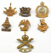 Quantity of seven First World War Royal Naval Division cap badges to include 1st (Drake) Battalion