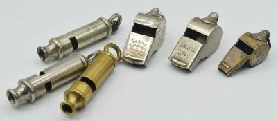 Quantity of six Military and ARP whistles to include Air Ministry 23/230 whistle, J.Hudson Co