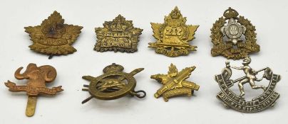 Quantity of Eight Canadian MIlitary Cap Badges to include: Le Regiment de Maisinneuve, 2nd C.M.R (