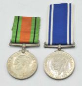 Second World War Police medal Pair comprising of 1939-45 Defence Medal and Police Long Service