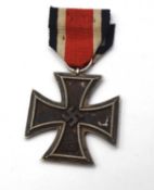 Second World War Thrid Reich German 2nd Class Iron Cross with original ribbon , suspension loop